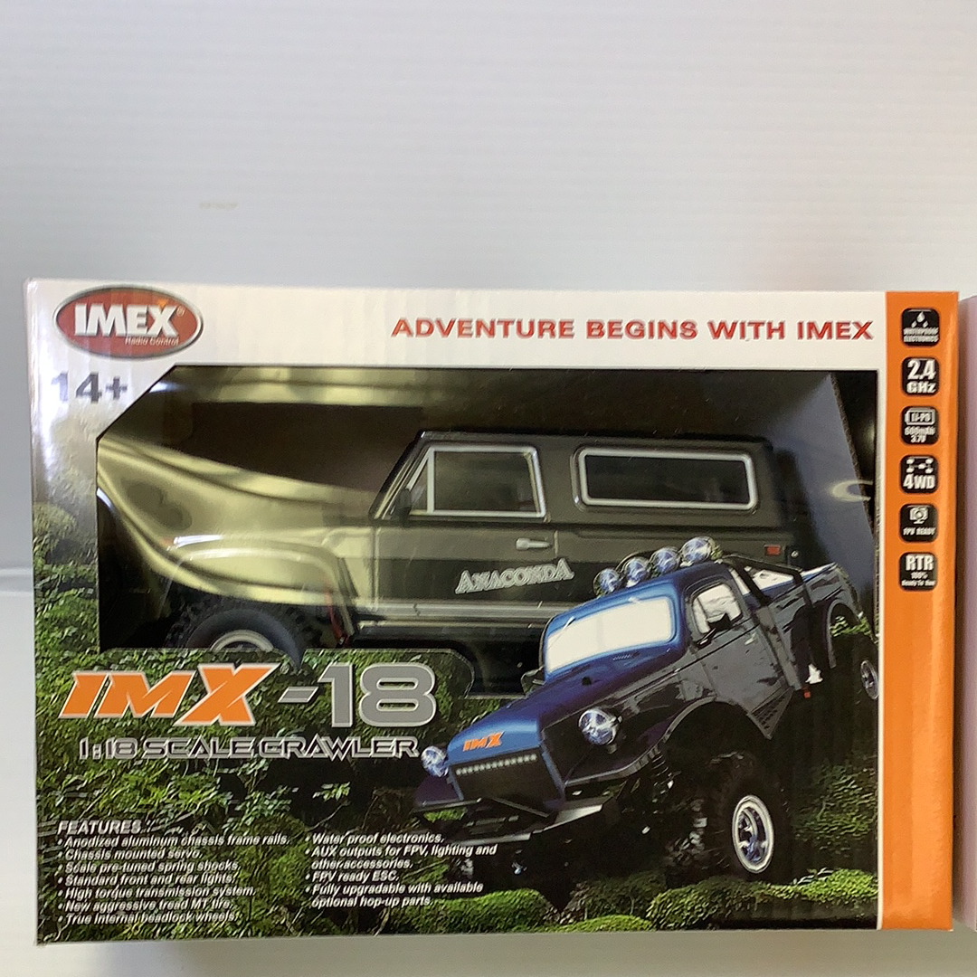 Scale crawler toy set featuring two detailed, rugged vehicles for IMX IMX25005