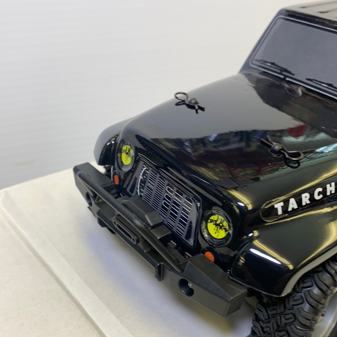 Black scale model crawler with rugged tires and grille detail for IMX IMX25055