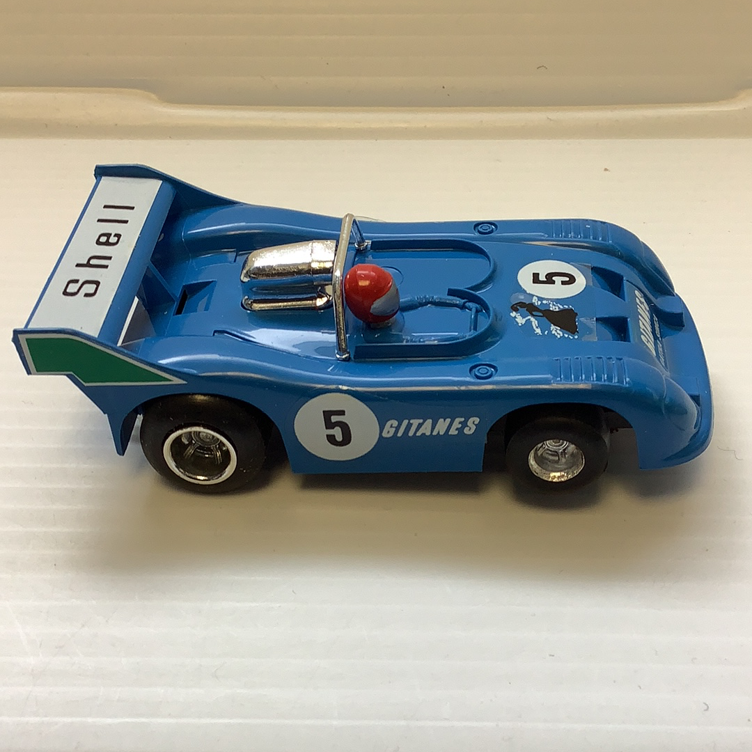 Blue toy race car with "Shell" and "GITANES" markings for Polistil Evolution A.105