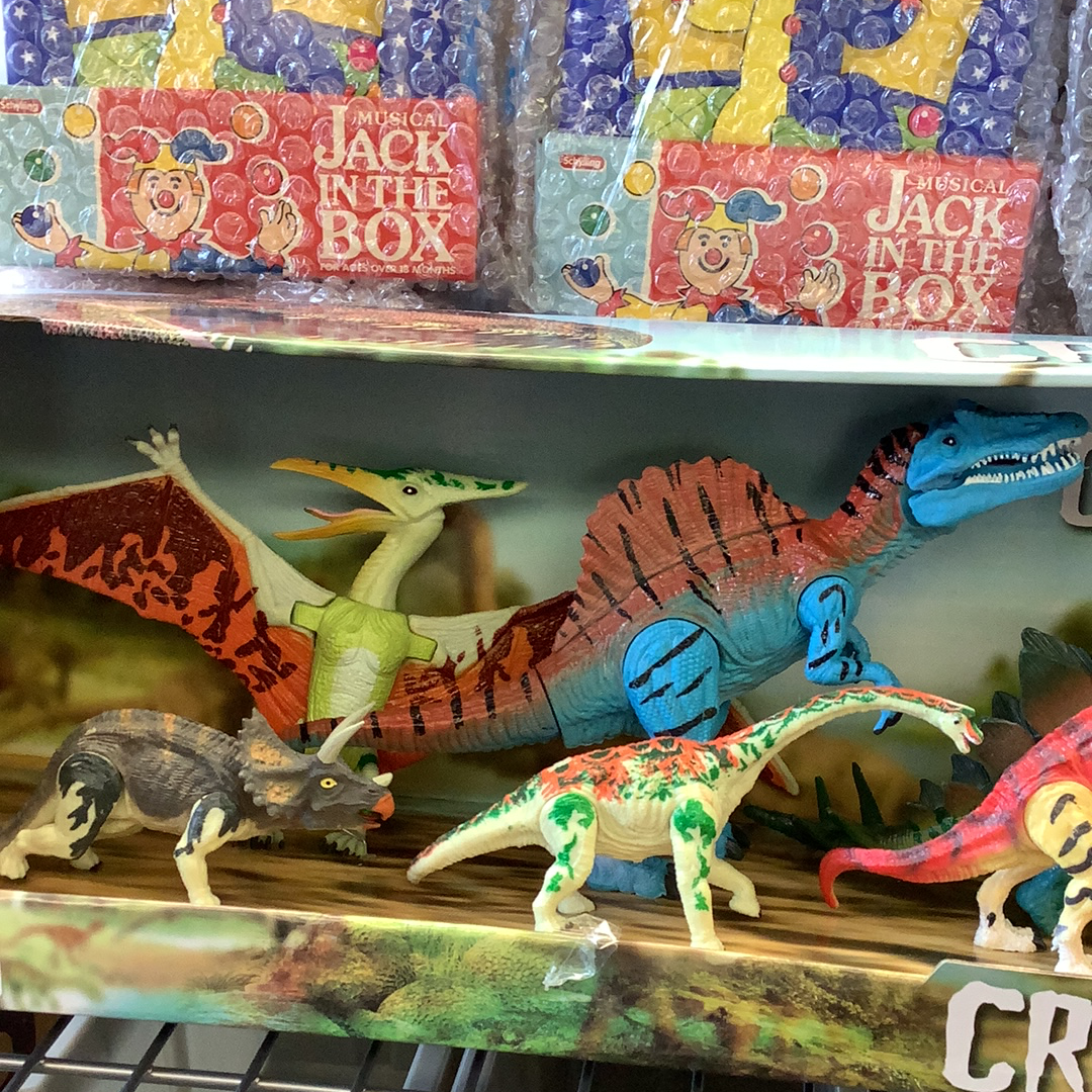 Dinosaur toy set featuring various prehistoric reptiles in a display case for 12 dinosaurs 49010, display case view, product view 2