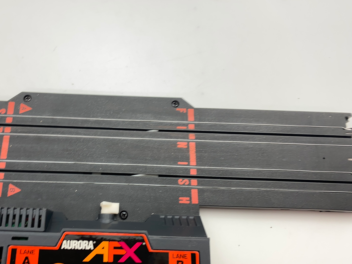 Vintage Aurora AFX train track section with red "F N" markings for Aurora Tomy AFX Vintage 8639