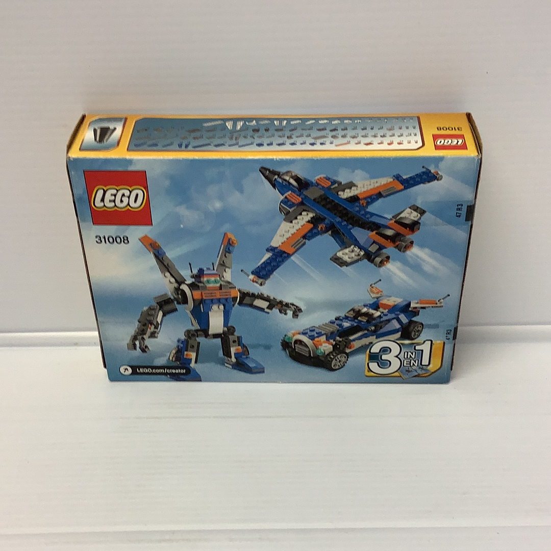 LEGO set box showing three assembled vehicles: jet, robot, and car for 31008