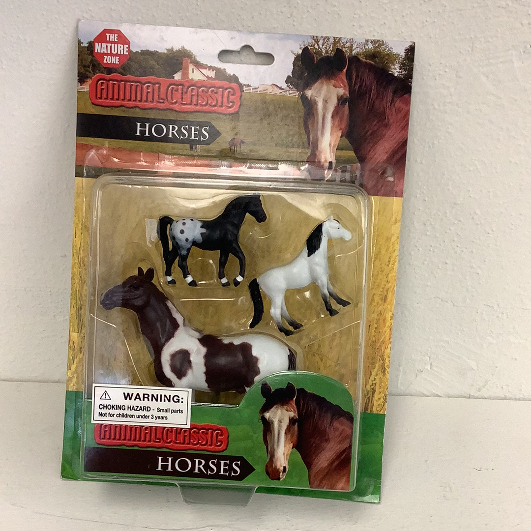 Assortment of four plastic horse animal figures in clear packaging for The Nature Zone IMX49582