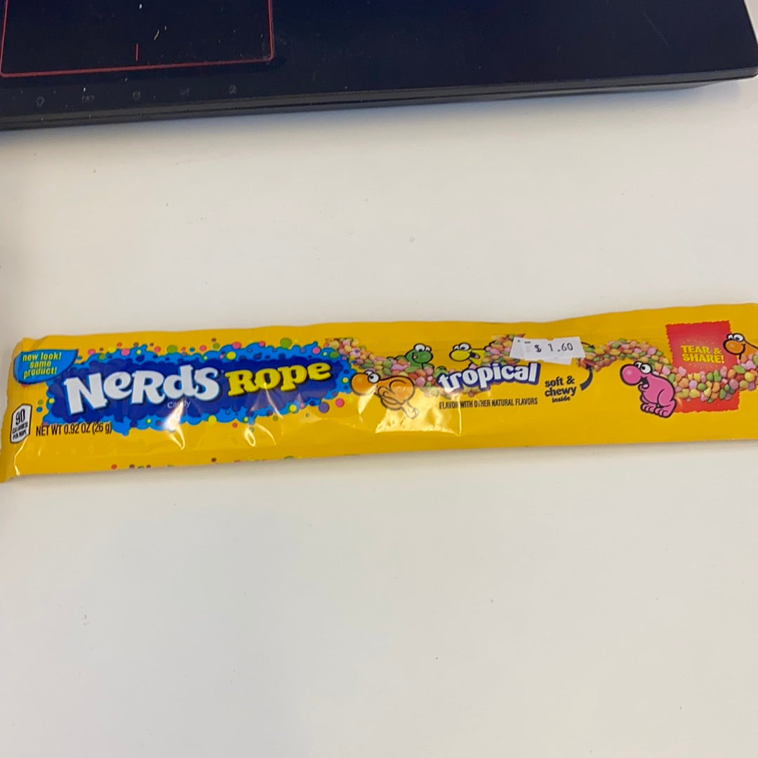 Yellow candy wrapper for Nerds Rope Tropical, featuring colorful candy illustrations for Nassau Candy 41560