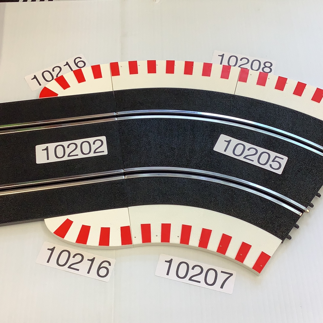Road curbing pieces for a standard curve border, labeled 10216, 10202, 10205, 10208, 10216, 10207 for Ninco