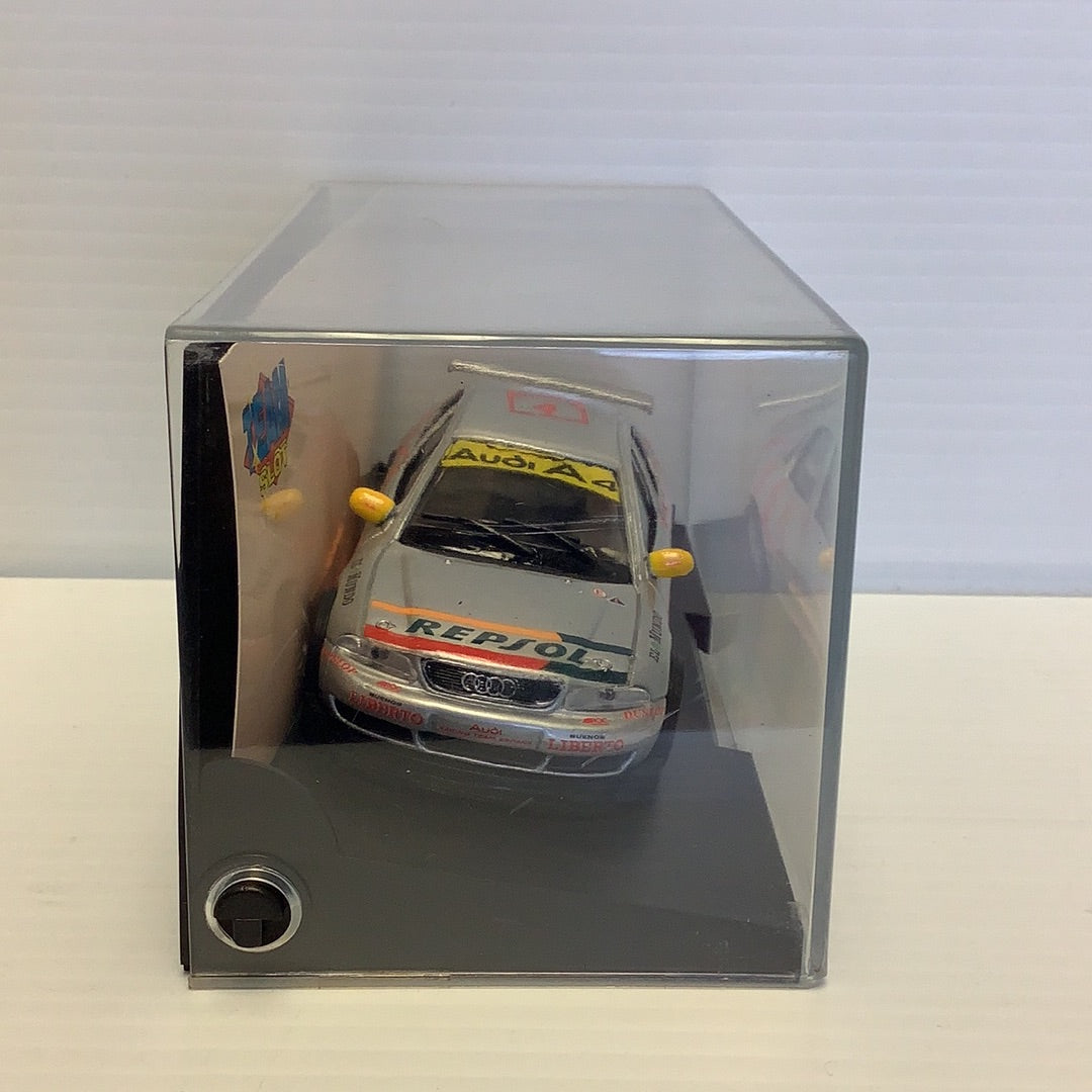 Slot car of a race car, Audi A4, displayed in a clear case for Team Slot 10401