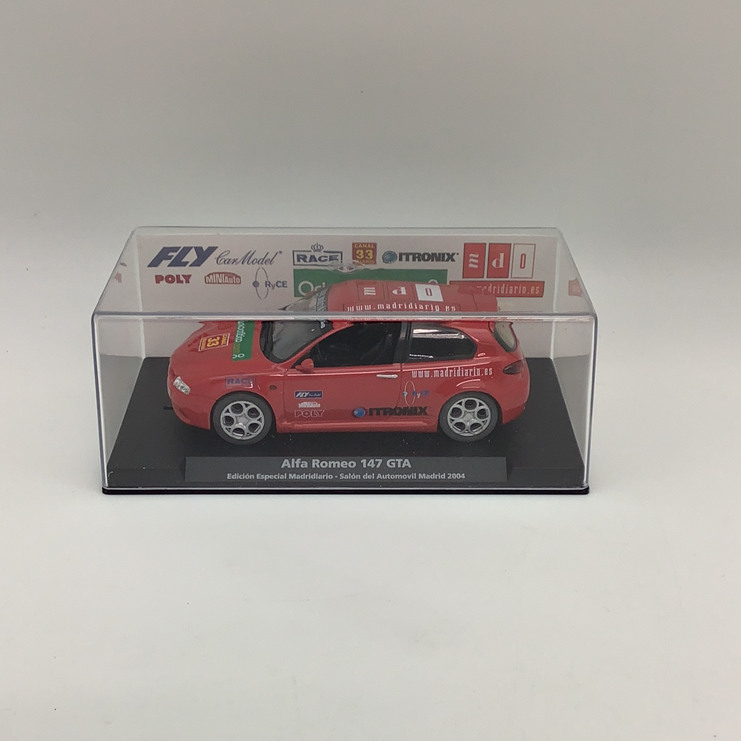 Red slot car of an Alfa 147 GTA from the 2004 Madrid car show for Fly Car 96046