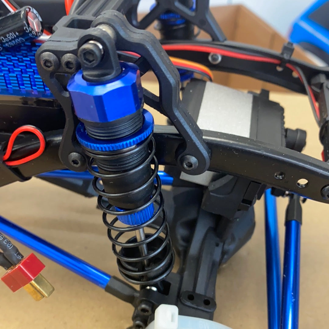 Suspension spring and black metal arm assembly on a crawler truck chassis for IMEX 22020