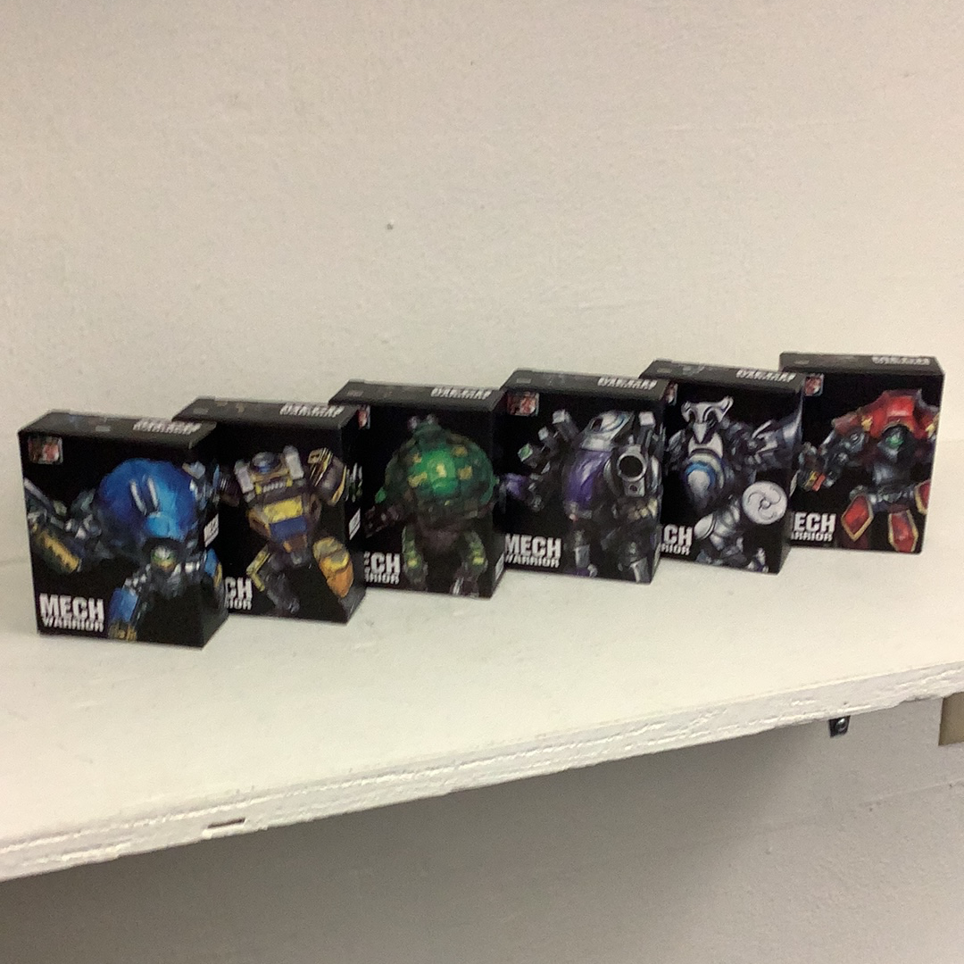 Assortment of collectible mech warrior action figure boxes for Schylling 88392TY