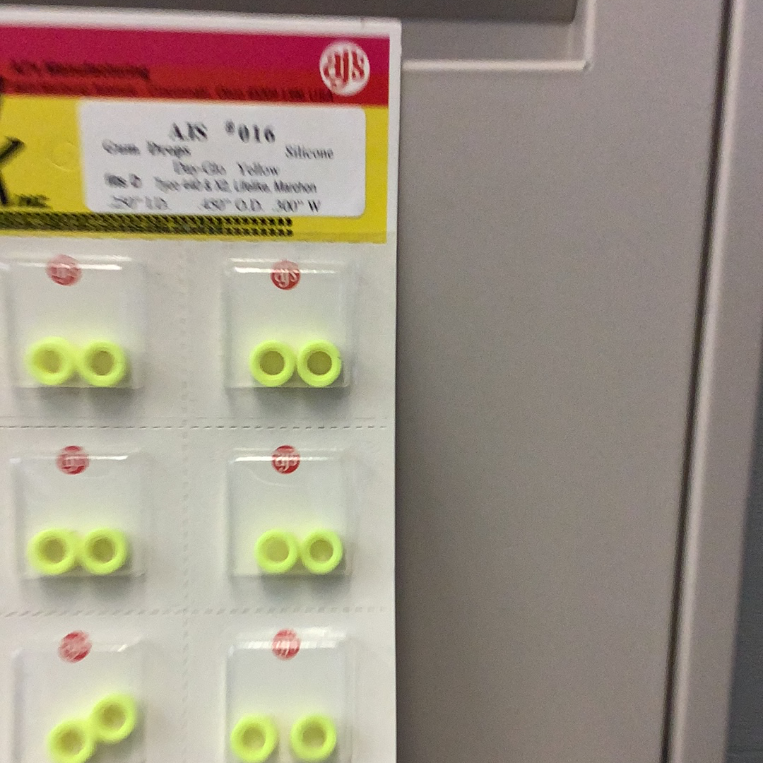 Silicone gum drops in day-glo yellow, arranged in a grid pattern for Gum Drops Silicone Day-Glo Yellow Tires 016