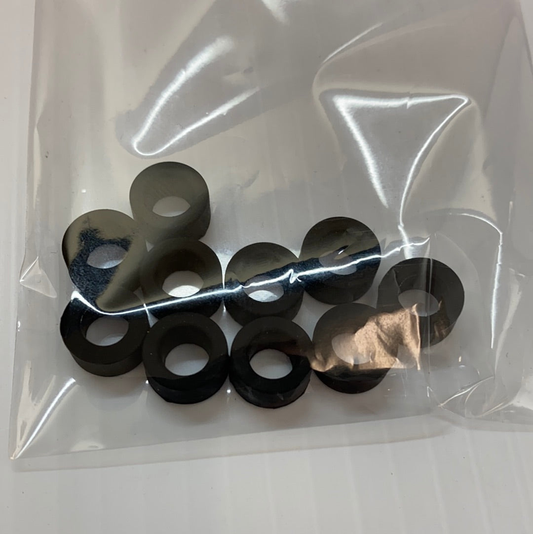 Set of ten black slot car rear tires in clear packaging for Auto World CP7907, package view, product view 2