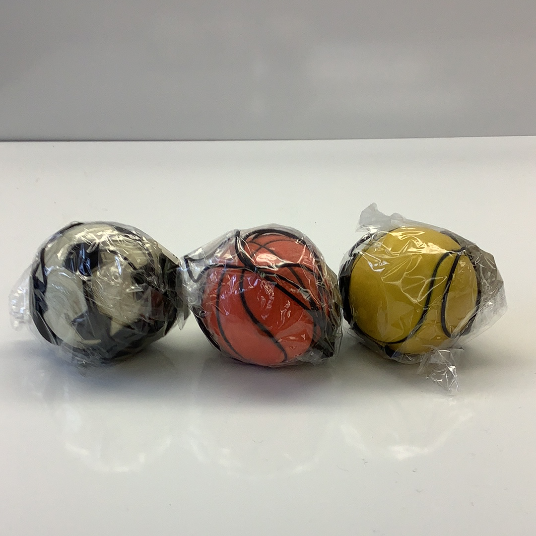Three colored sponge return balls wrapped in clear plastic for IMEX-Toys 66666
