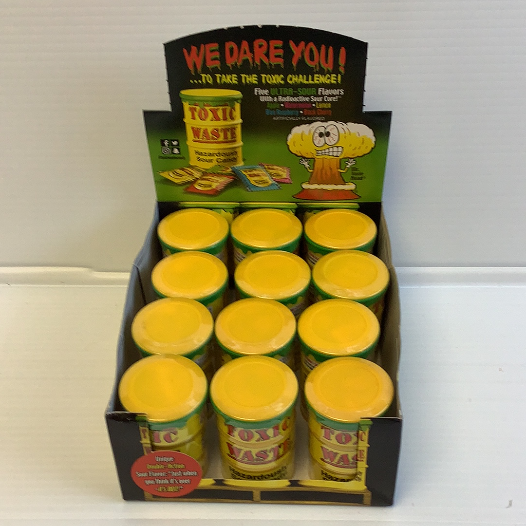 Assortment of yellow and green sour candy in a cardboard box for Nassau Candy 8887