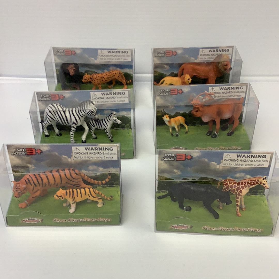 Assortment of wild animal toys in clear plastic packaging for Schylling IMX49571