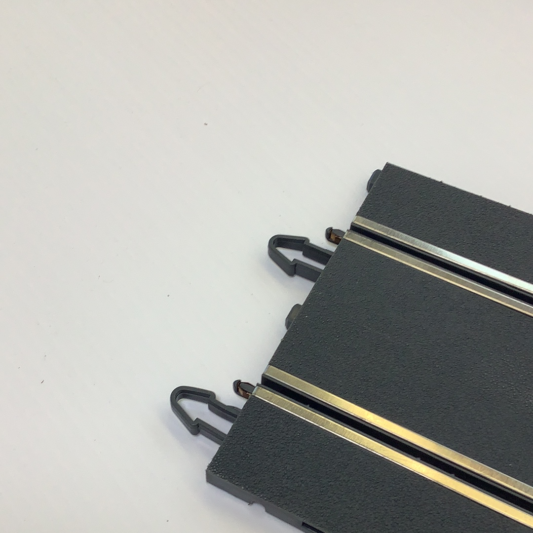 Two black terminal units with metal handles, laid out on a white surface for SCX A4000