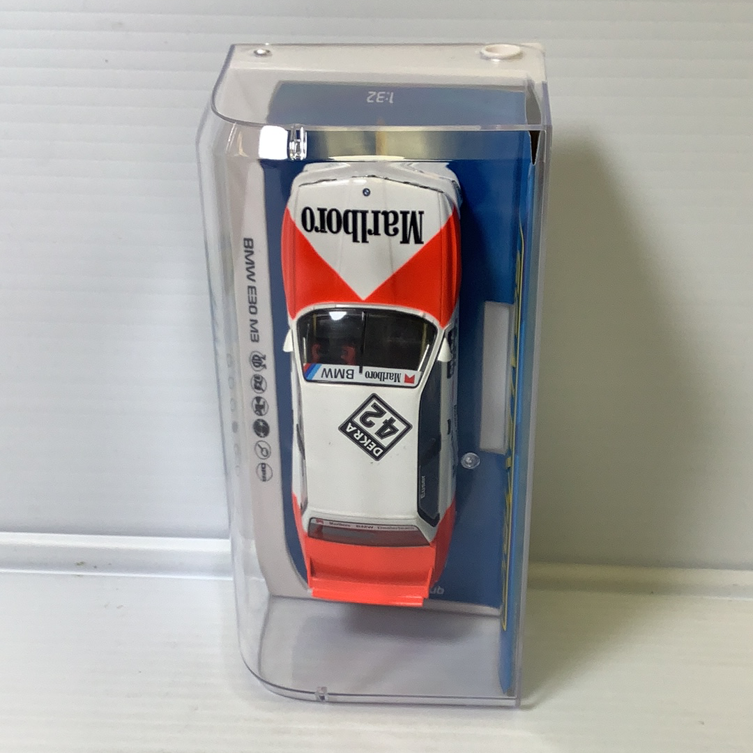 Slot car of a 1991 BMW E30 M3 race car in a clear box for Scalextric C4168