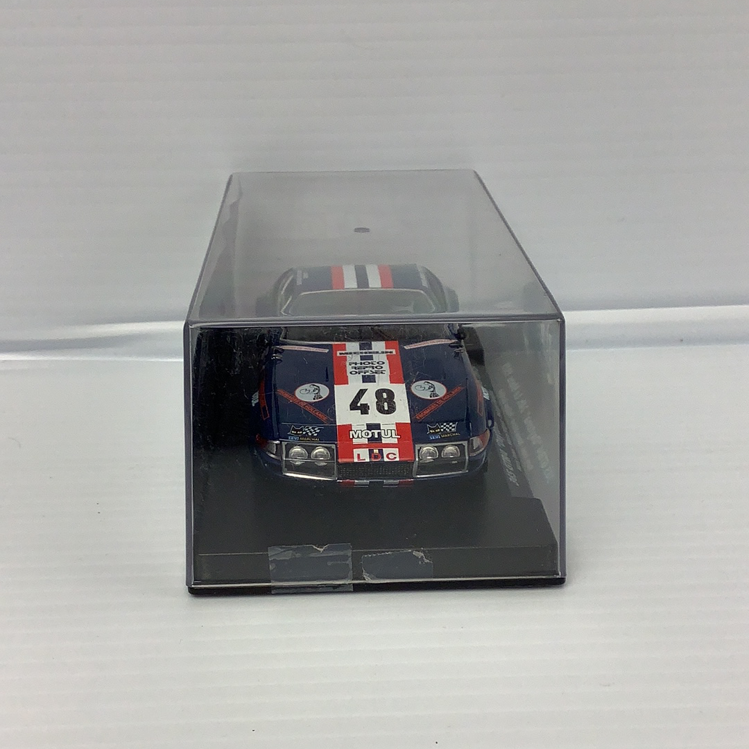 Slot car of a 1975 365 GTB/4 race car in a clear case for Fly Car 88155