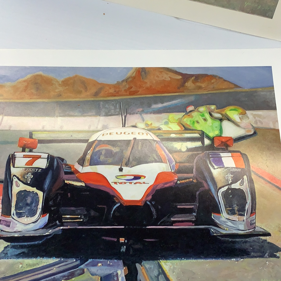 Slot car race cars on a track with distant mountains under a bright sky for Timothy W. Young 11”x14”