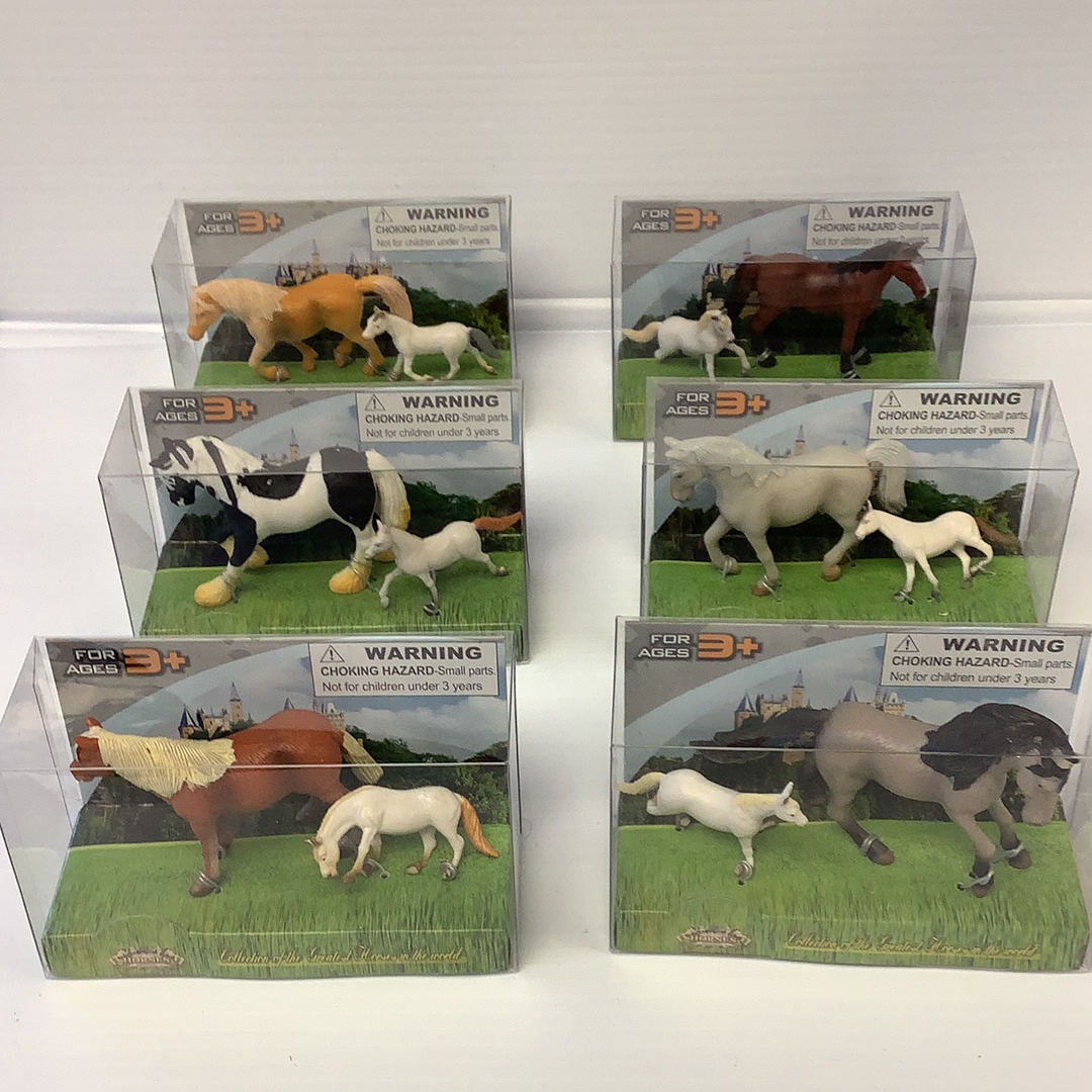 Assortment of toy horse sets featuring various breeds and poses for Schylling IMX49565