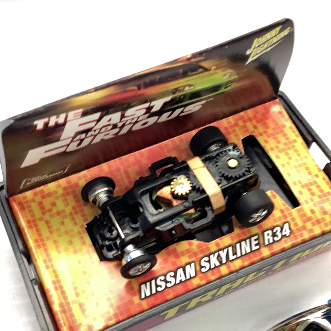 Slot car set featuring a Nissan Skyline R34 model car for Johnny Lightning 39503