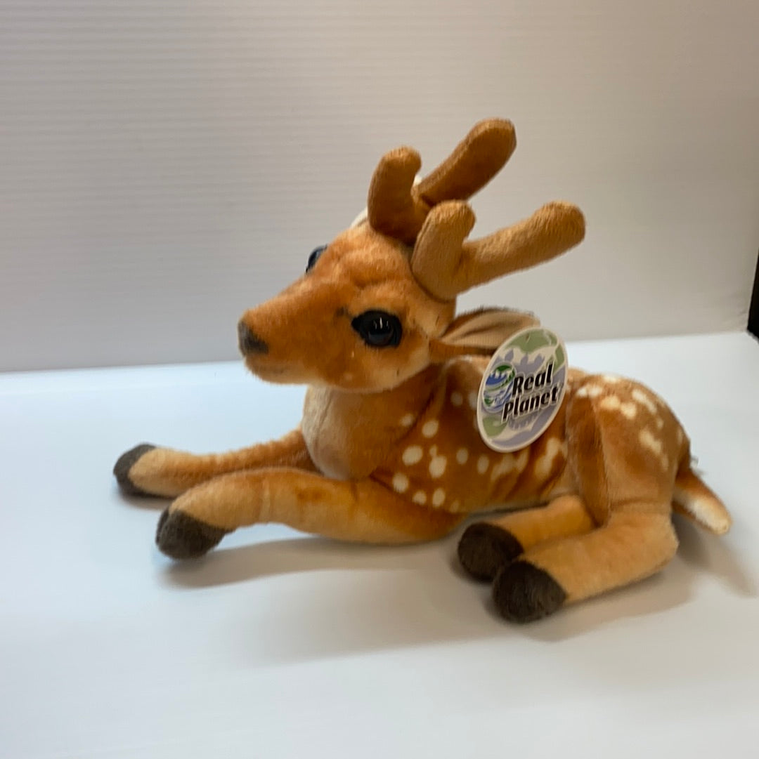 Stuffed deer toy lying down, brown and tan with spotted pattern for Real Planet DE32P