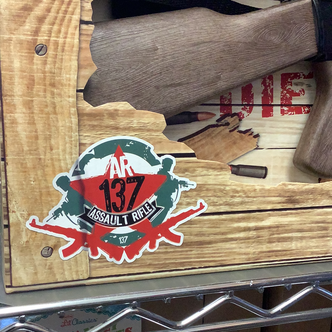 Assault rifle decal with "AR 137" on a wooden surface for Gonher 137/6