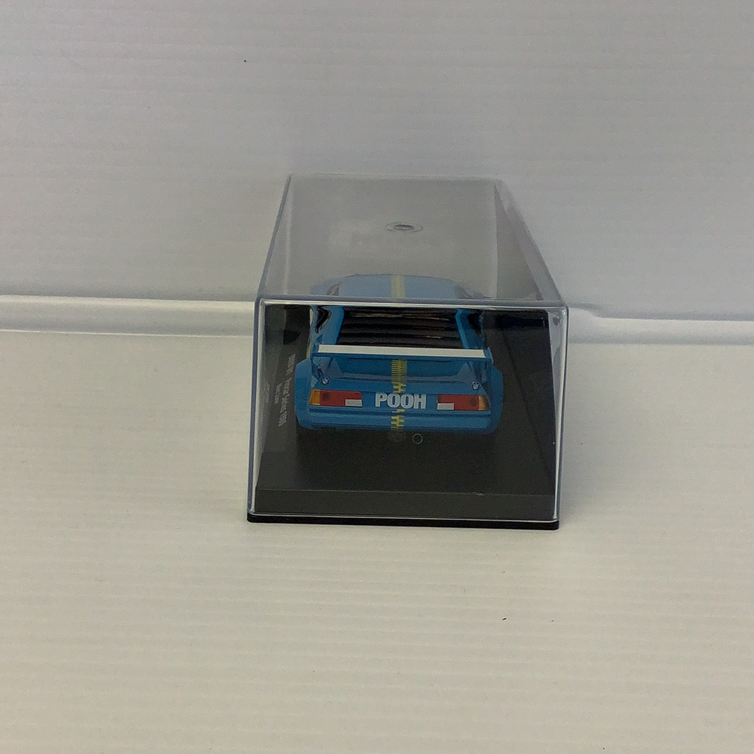 Blue slot car in a clear display case for Fly Car 88205