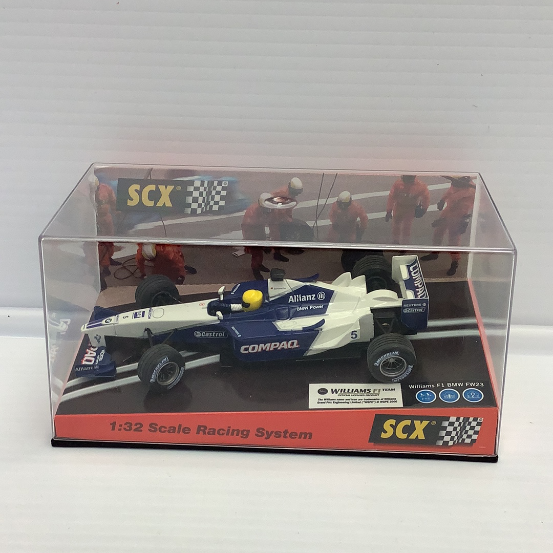 Blue and white 1:32 scale model race car in its box for SCX Analog 1/32 60950