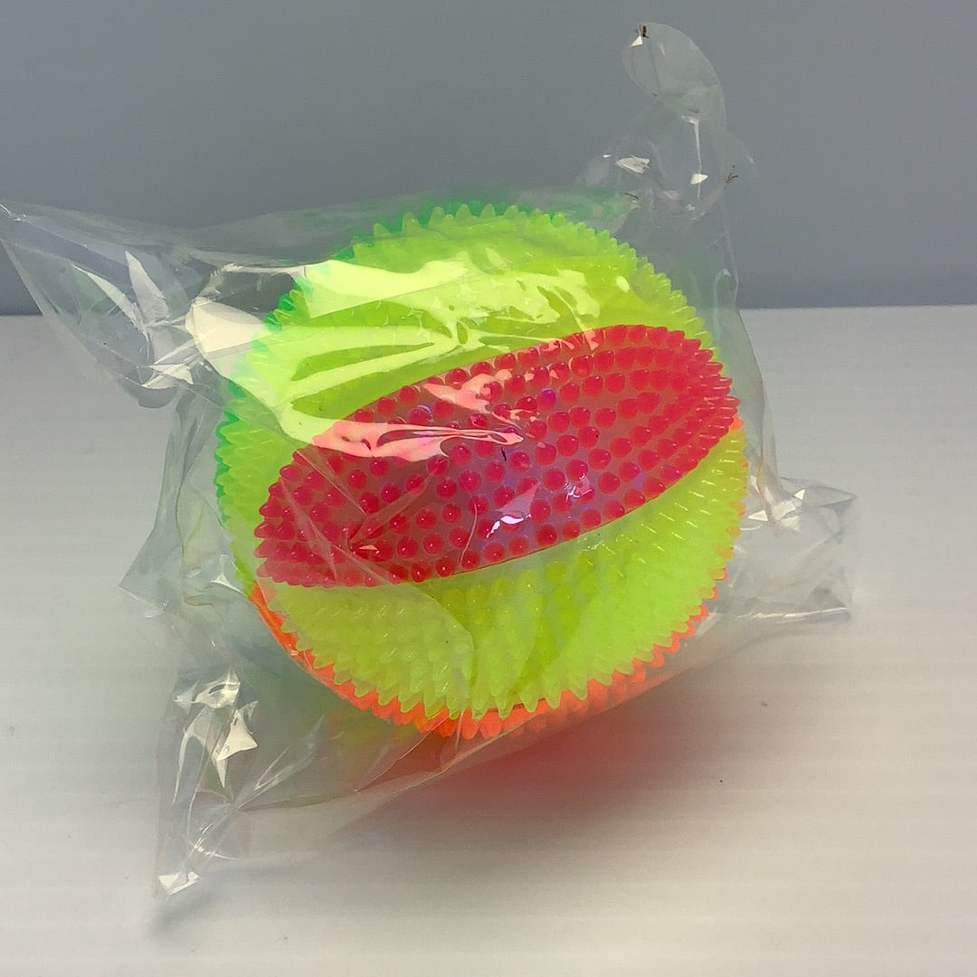 Neon green and pink light-up squeaky beach ball in clear packaging for BVP 84116