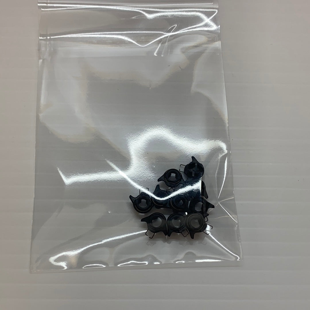 Small black return springs packaged in a clear plastic bag for SCX ARS SD01737