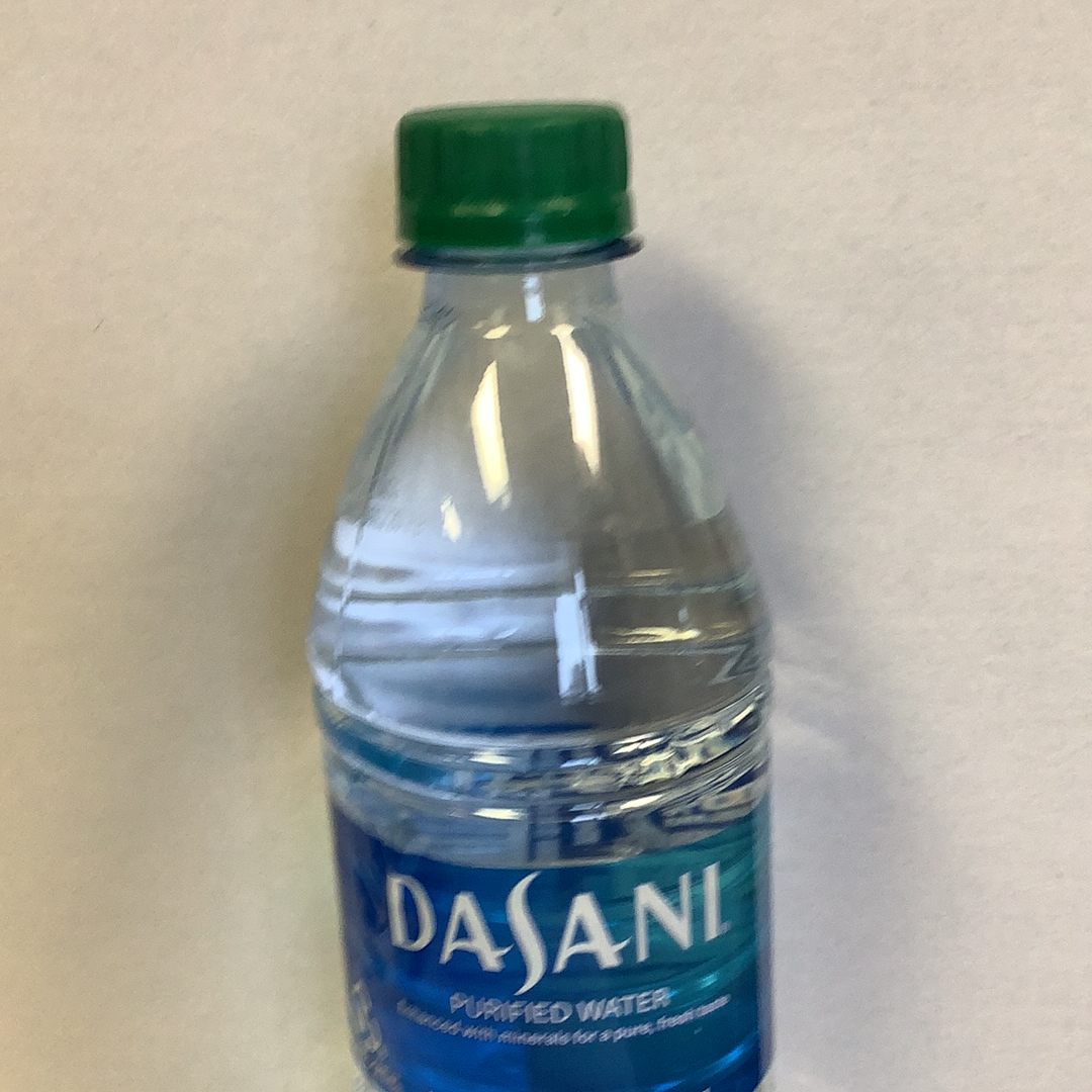 Clear plastic water bottle with a green cap and blue label for Coca-Cola 02762