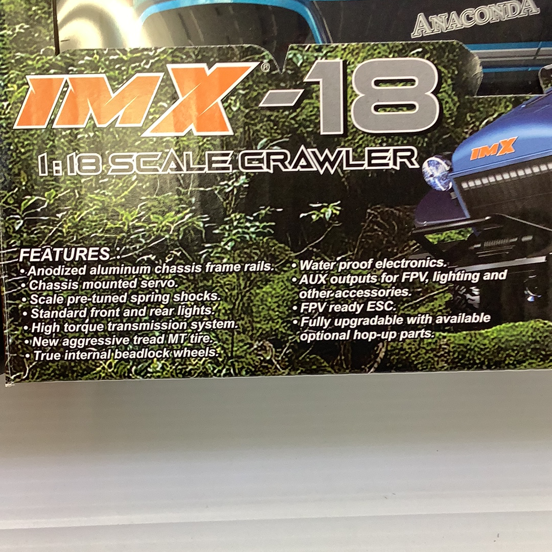 Remote-controlled scale crawler with detailed features and durable build for IMX IMX25005