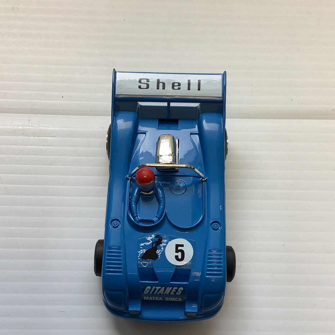 Blue slot car toy with "Shell" and "Gitanes" visible on the front for Polistil Evolution A.105