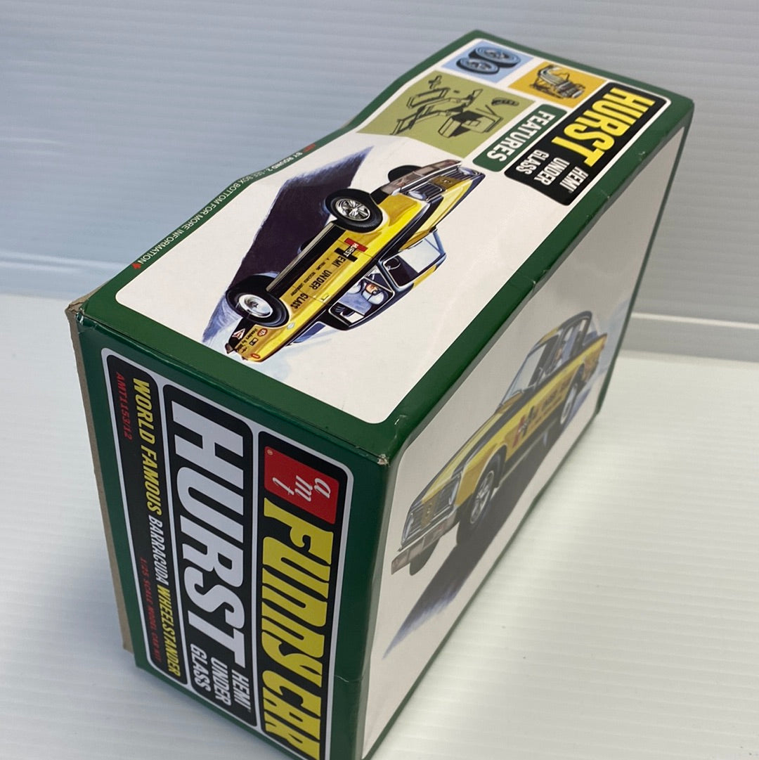 Model kit box art featuring classic drag racers, Hurst Hemi Under Glass for AMT AMT1153