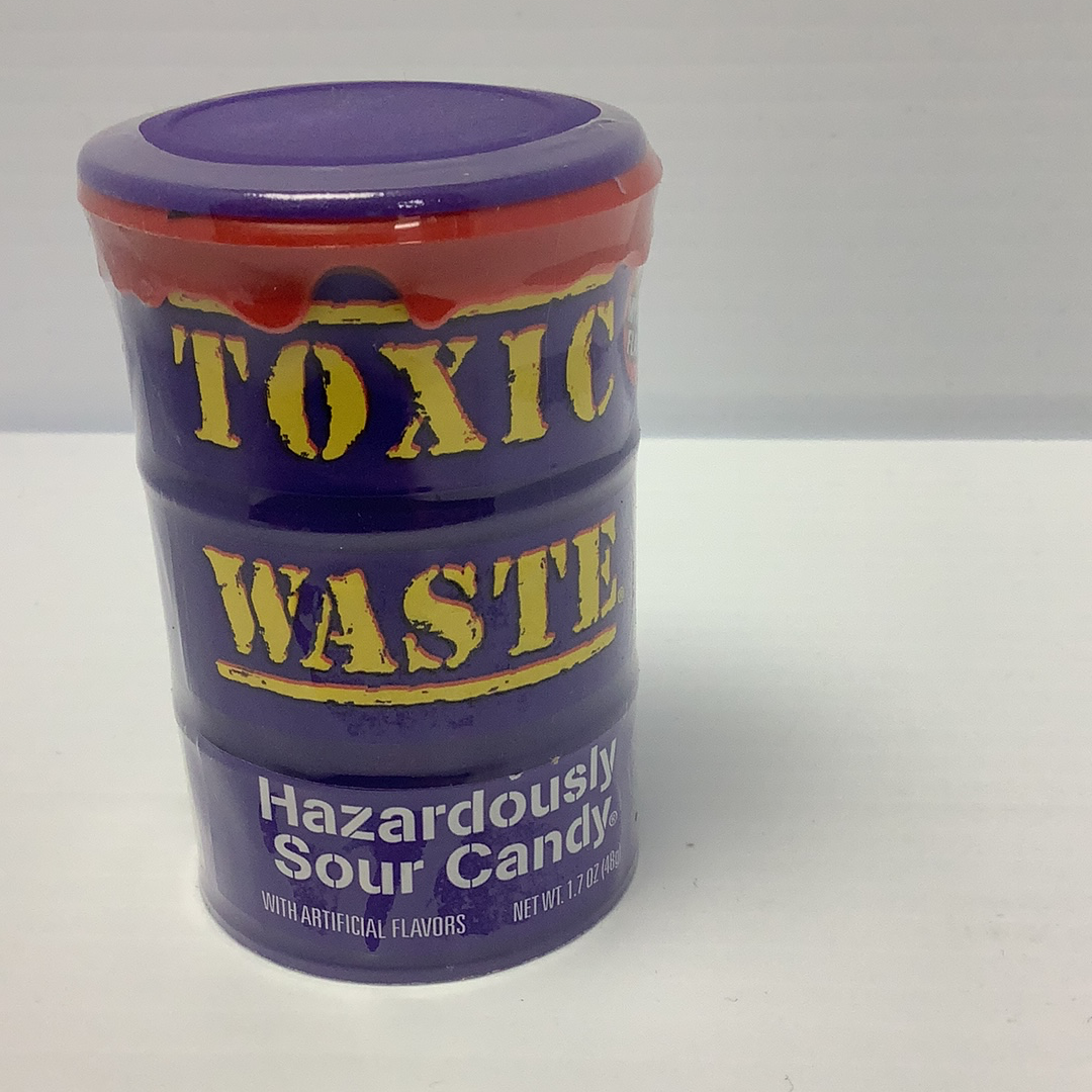 Purple candy container labeled "Toxic Waste" sour candy for Nassau Candy 25843