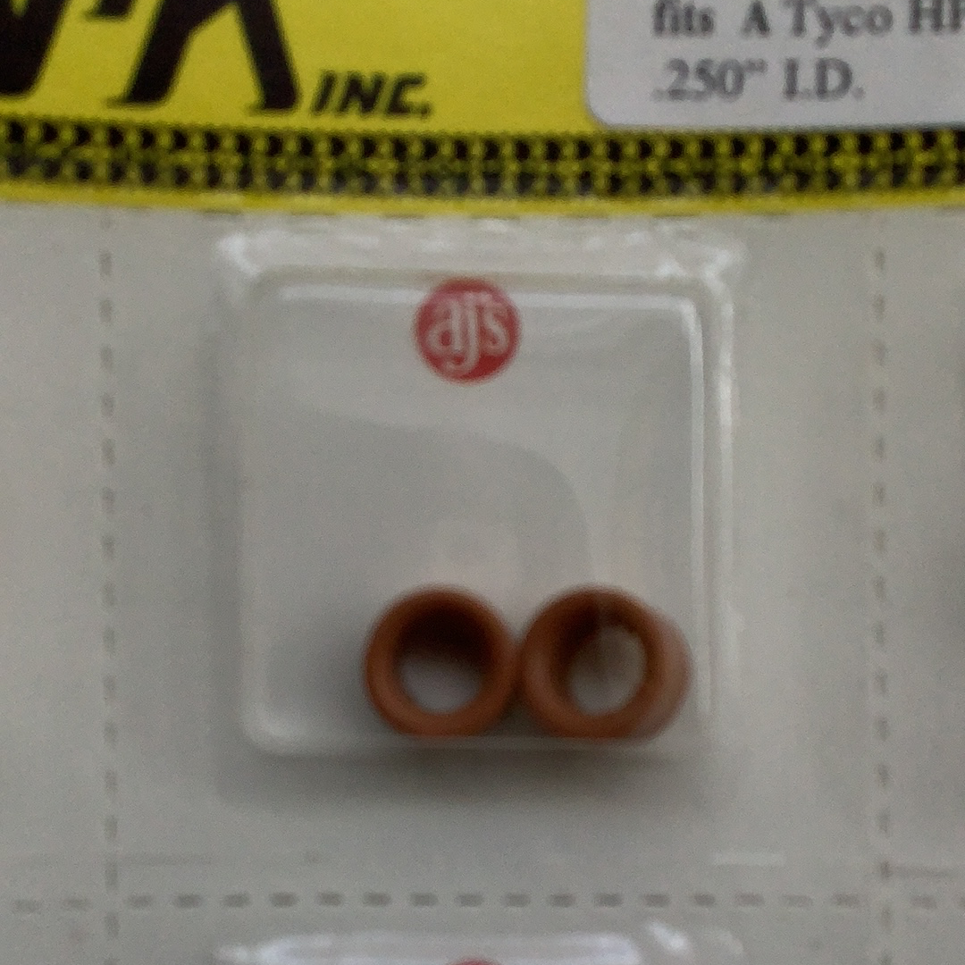 Two rusty red silicone rings for sealing or gasket use for Red Devils Silicone Rusty Red Tires 009