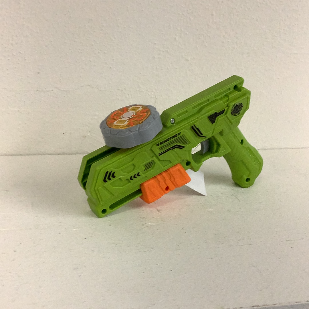 Green toy blaster gun with a circular, orange-accented spinning top attachment for Schylling 88282TY
