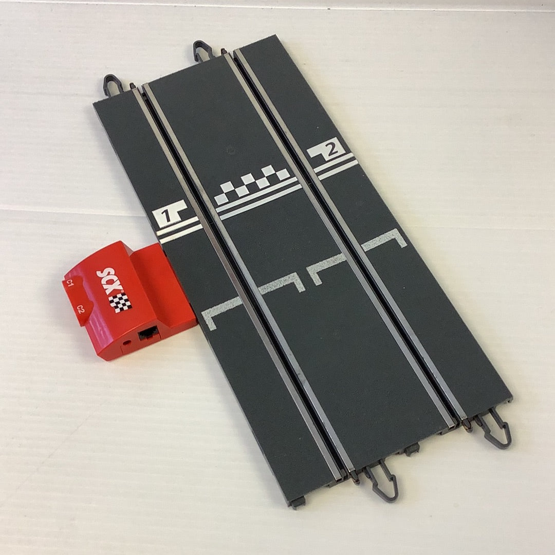 Two black terminal tracks with numbered indicators and a red accessory box for SCX A10016X200