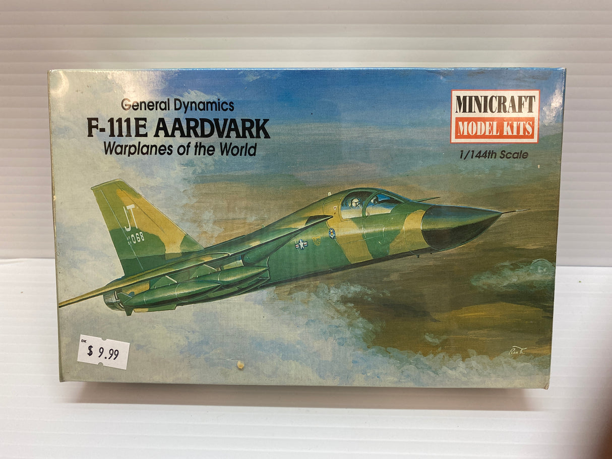 Model kit box art showing a green F-111E Aardvark jet fighter for Minicraft 14420
