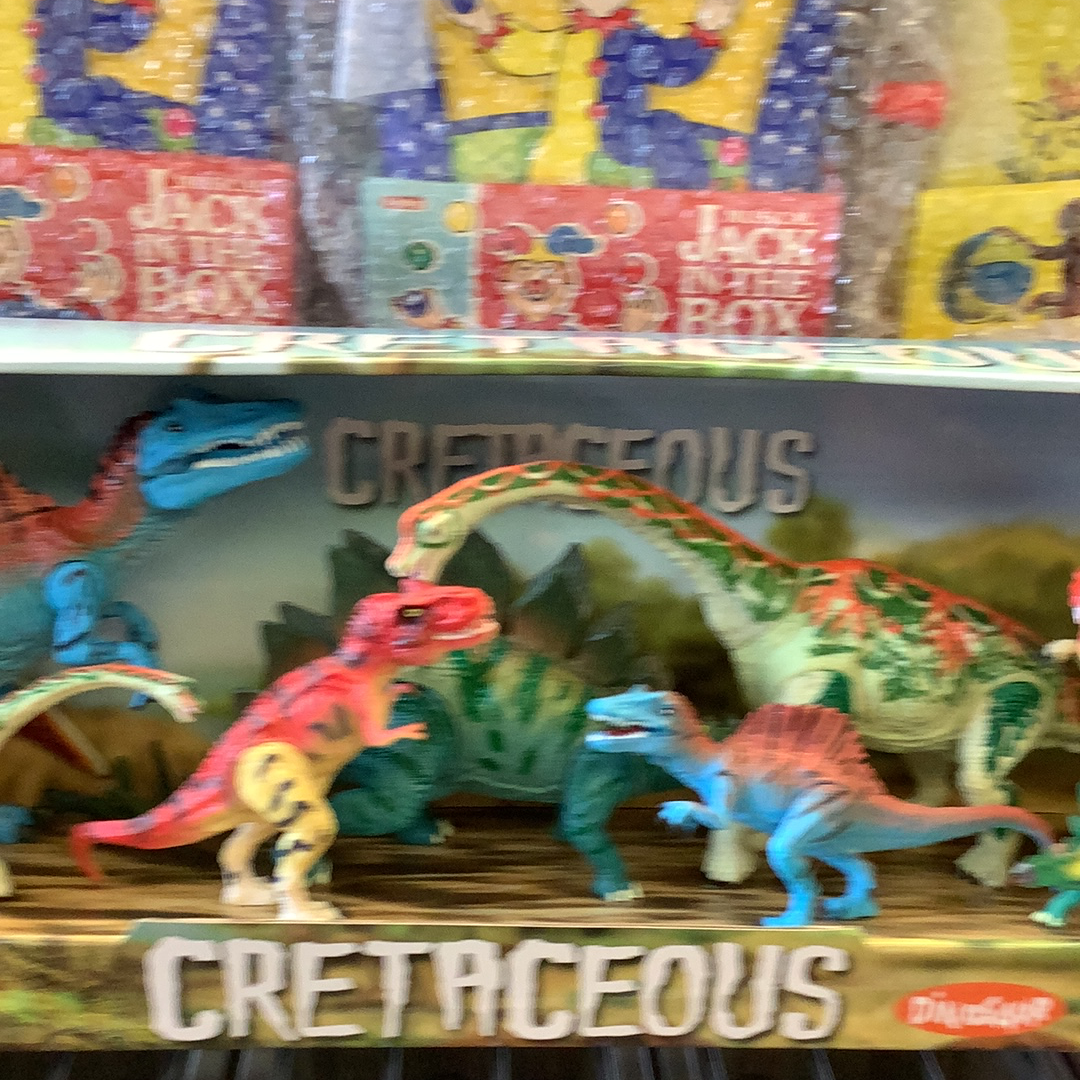 Dinosaur toy set featuring various prehistoric reptiles in a diorama for 12 dinosaurs 49010