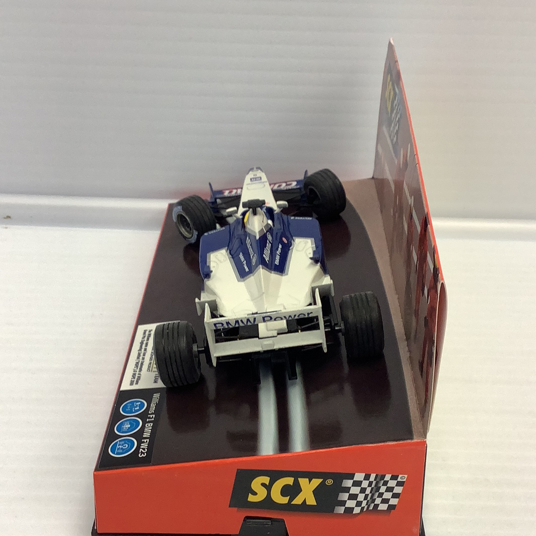 Scale model race car, Williams F-1 BMW FW23, displayed in its box for SCX Analog 1/32 60950