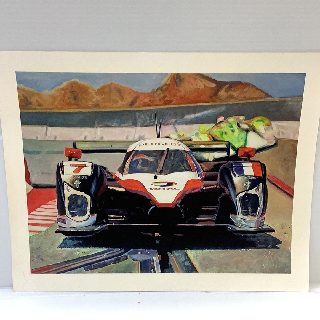 Slot car race car on track with distant mountains under a blue sky for Timothy W. Young 11”x14”, track view