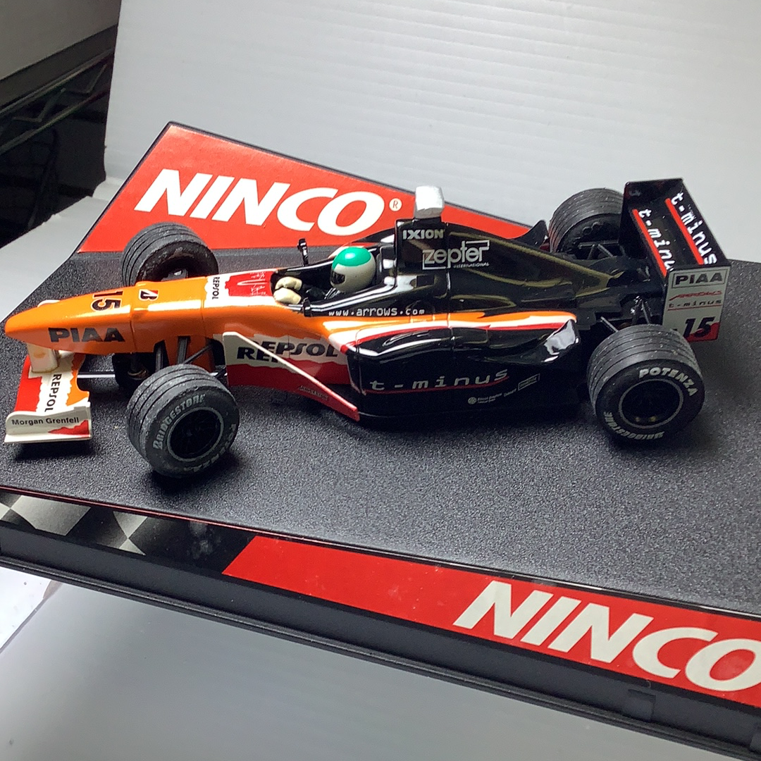Orange and black race car toy, replica of a Formula 1 car for Ninco 50212