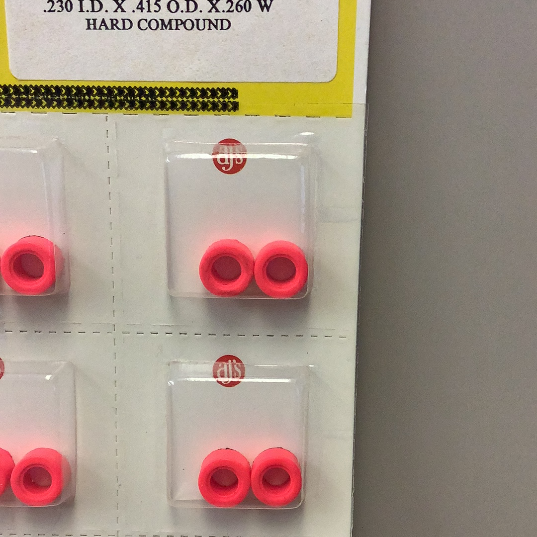 Hot pink silicone tires in various sizes, displayed on a product card for Gum Drops Silicone Day-Glo Hot Pink Tires 019