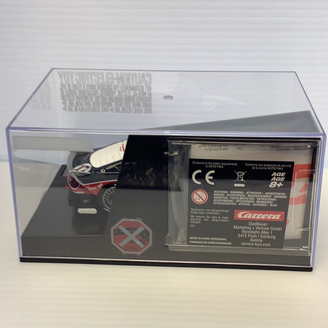 Slot car of a Ford Mustang GTY, displayed in its original box for Carrera Evolution 27636