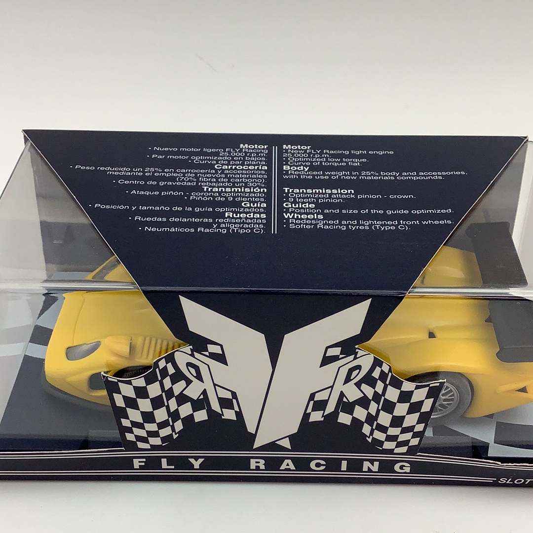 Yellow race car with checkered front spoiler, viewed from the front for Fly Car RG 0a