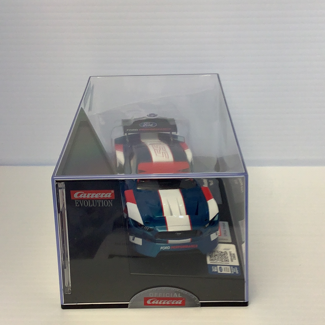 Slot car of a blue and white Ford Mustang in a display box for Carrera Evolution 27637