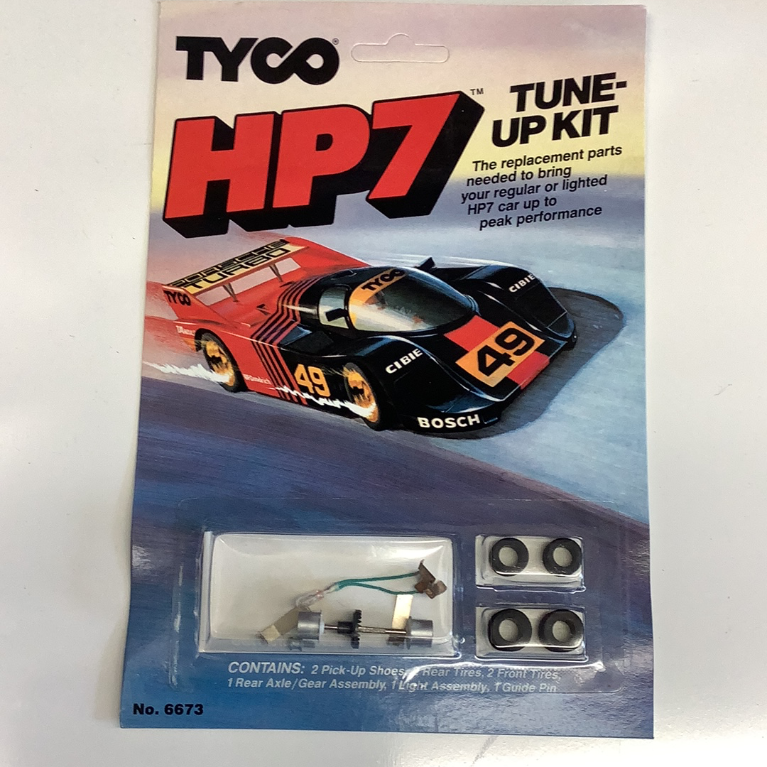 Car toy tune-up kit parts: tires, axle, light, and guide pin for Tyco 6673