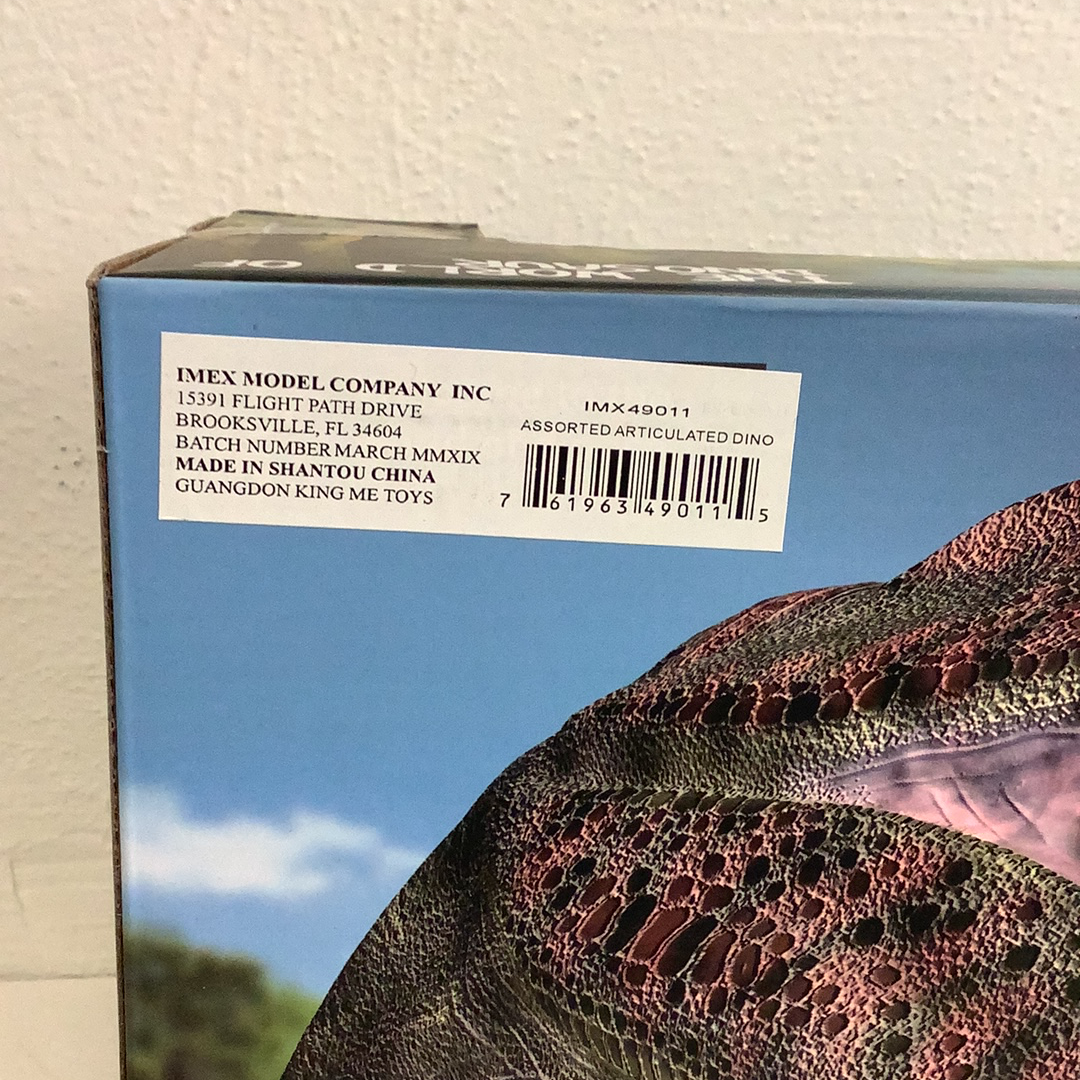 Dinosaur toy box art showing a textured, dark green dinosaur skin for IMEX Model Company IMX49011