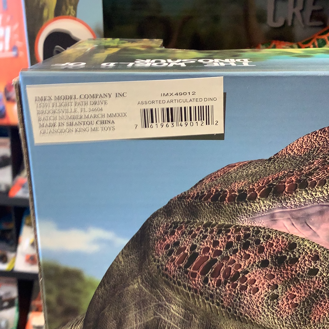 Assorted articulated dinosaurs displayed on product packaging for 3 dinosaurs 49012